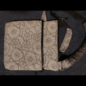 Gray and black quilted cross body purse